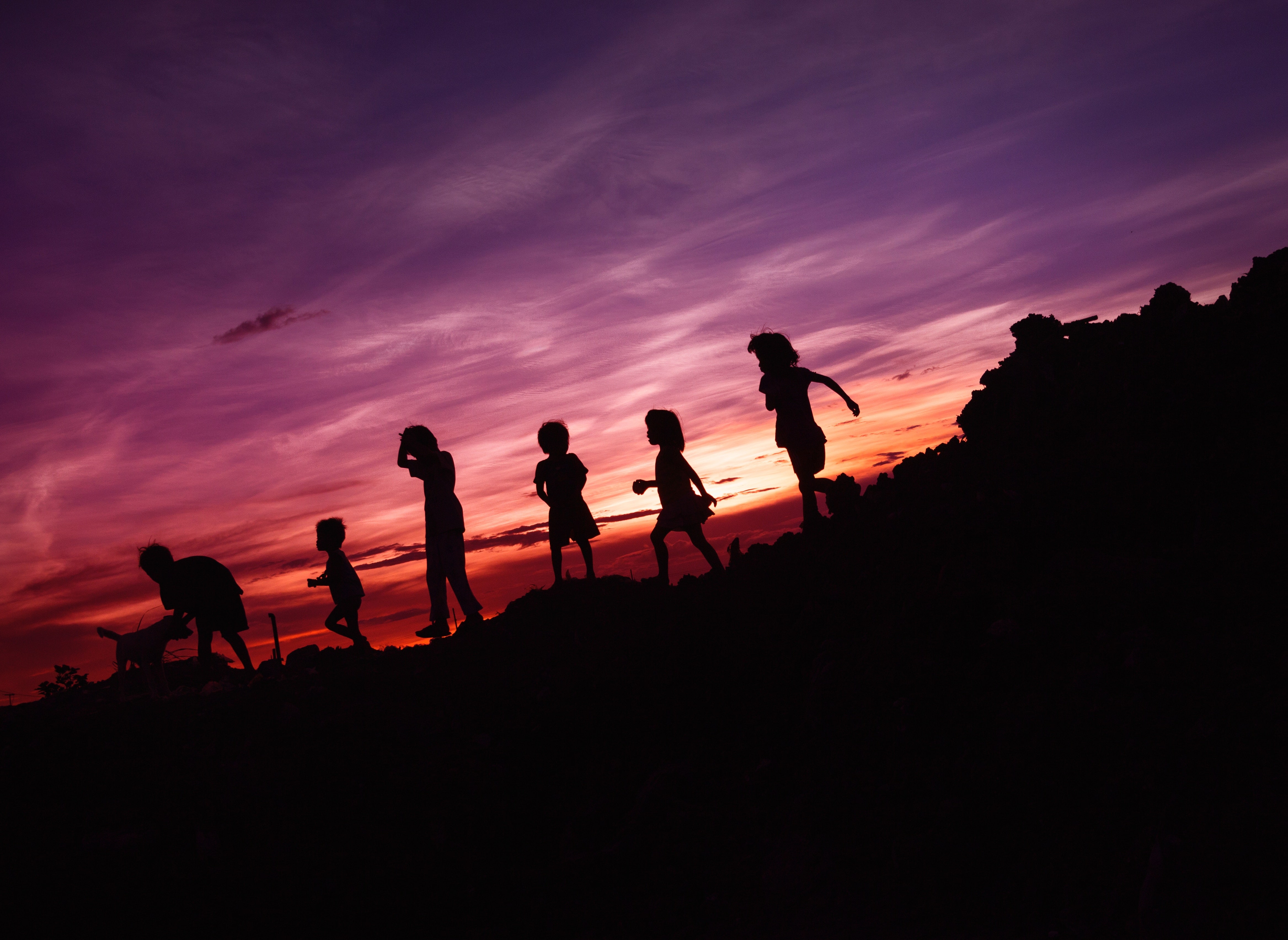 children in silhouette