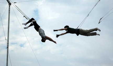 two people on trapeze